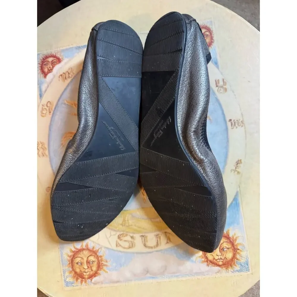 Salvatore Ferragamo Metallic Black Leather Bow Ballet  flats the color is bronze